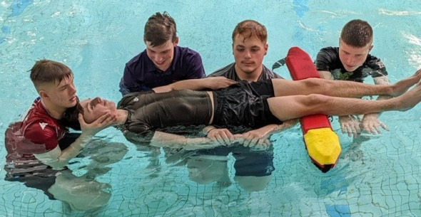 Lifeguards performing training exercise